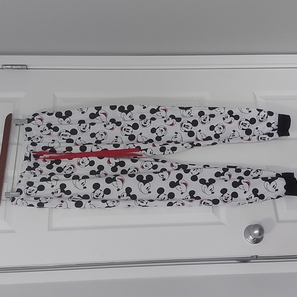 Disney Mickey Mouse pajama pants ,size small. See light pink stain in picture 4